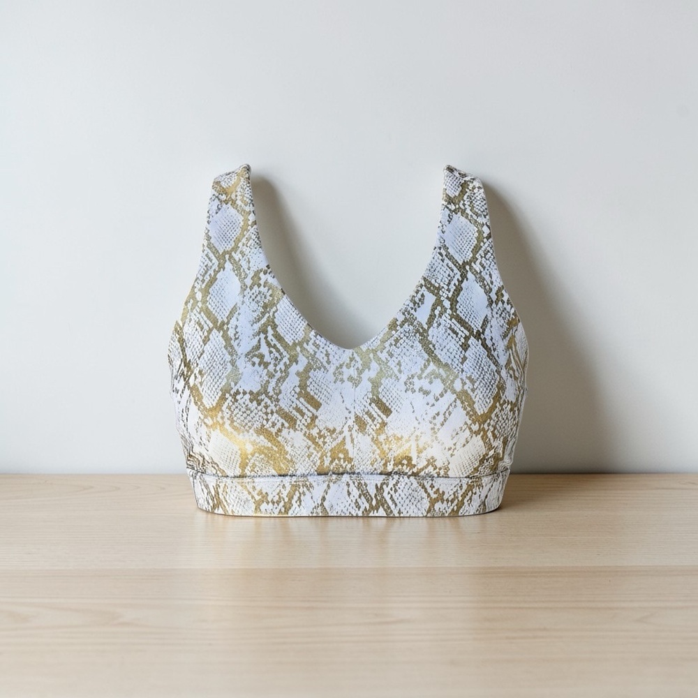 Fabletics White and Gold Snake-Print Scoop Sports Bra